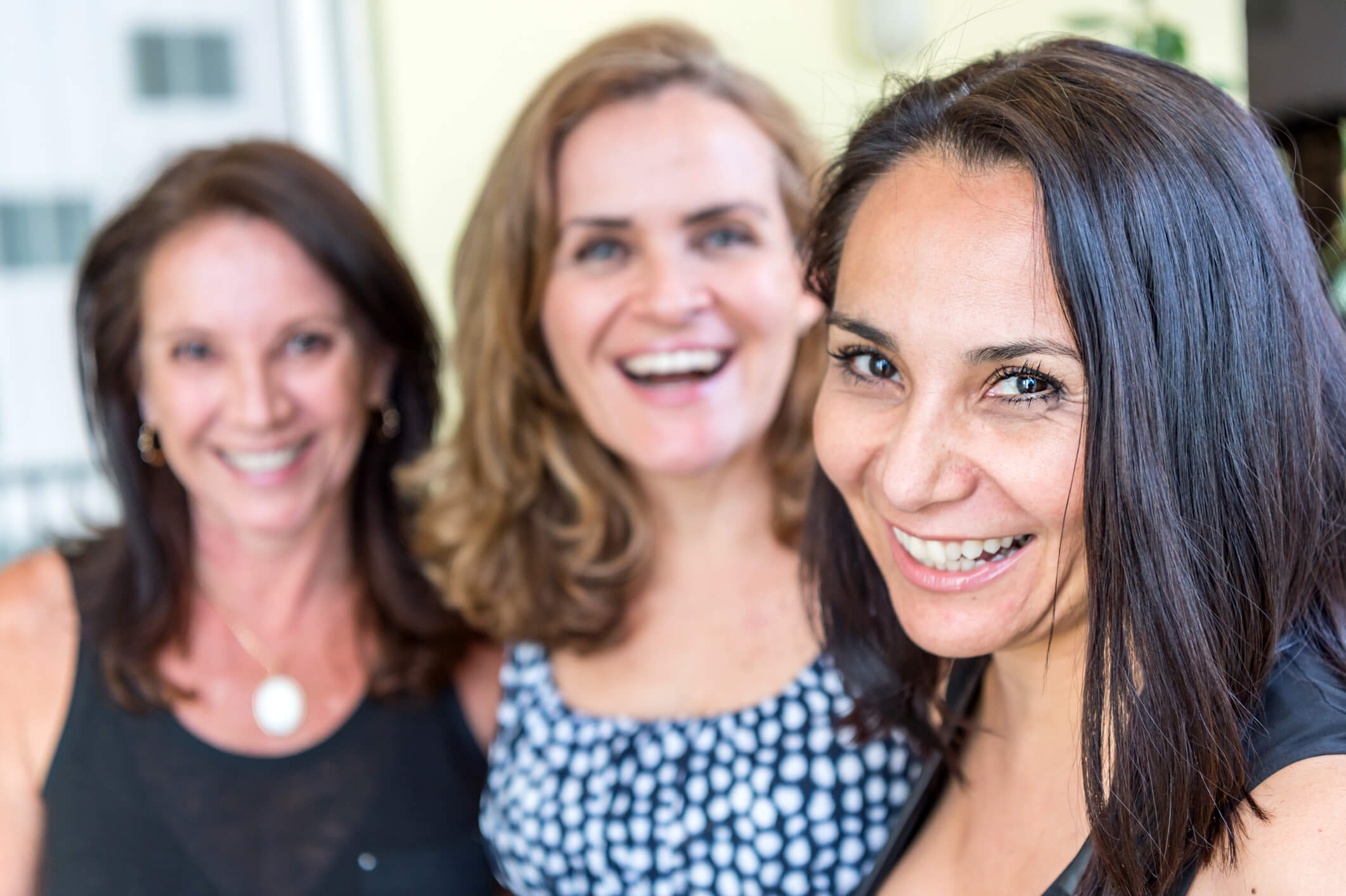 women in a group smiling